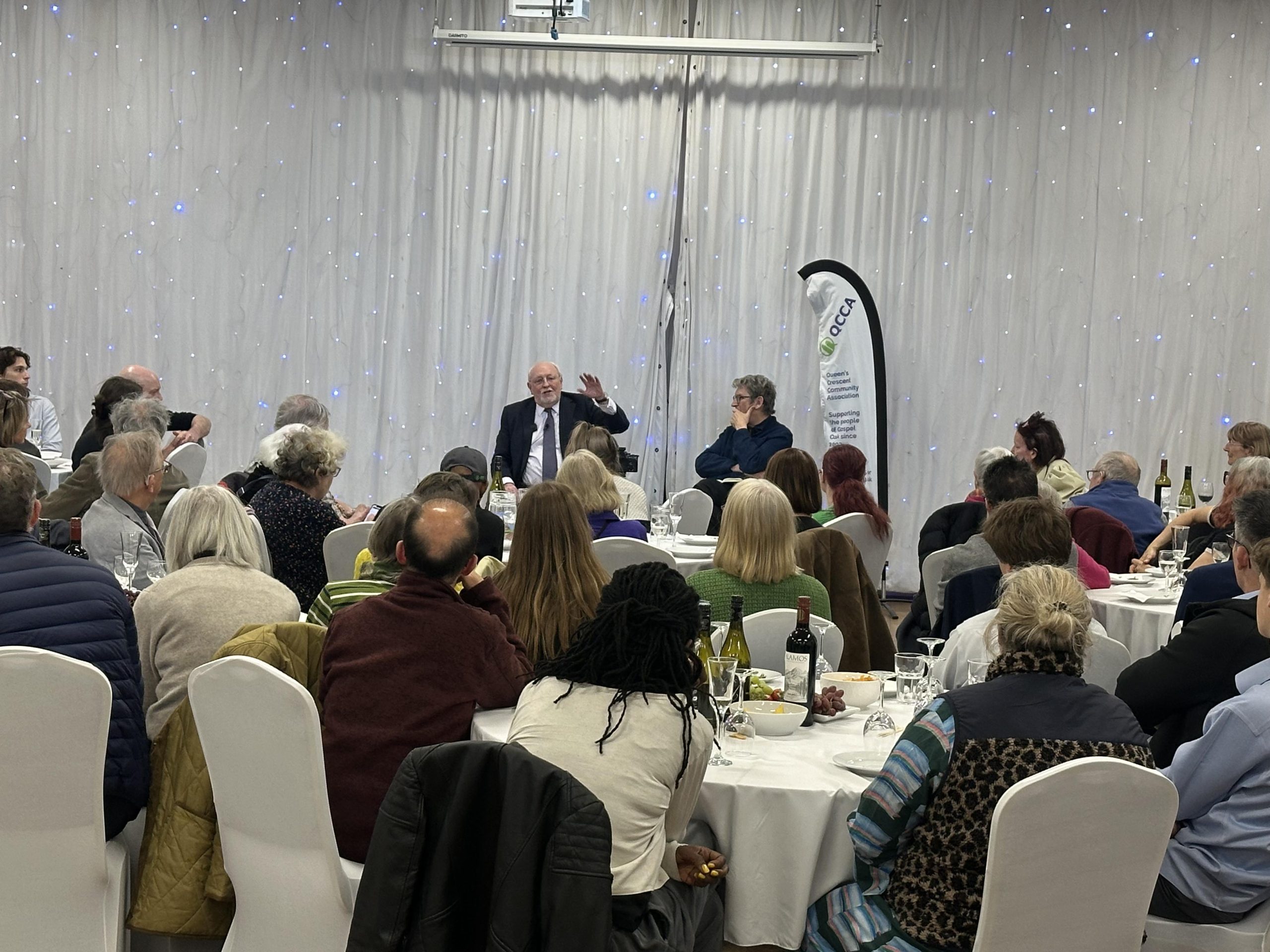 Neil Kinnock speaking to a packed audience at QCCA Camden Talks